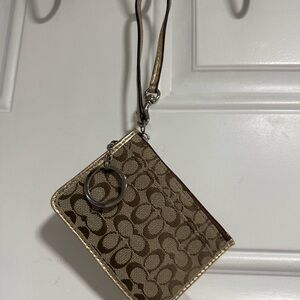 Coach Gold Wristlet with ID Window